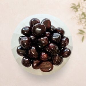 Garnet tumble stone for love, friendship, passion and devotion