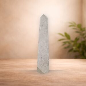 Crackle Quartz tower known as the “Stone of Light,” featuring sparkling internal fractures that reflect and amplify energy