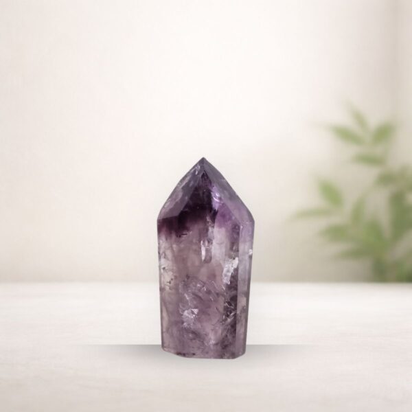 amethyst crystal point from Brazil with deep purple tones for calm and clarity